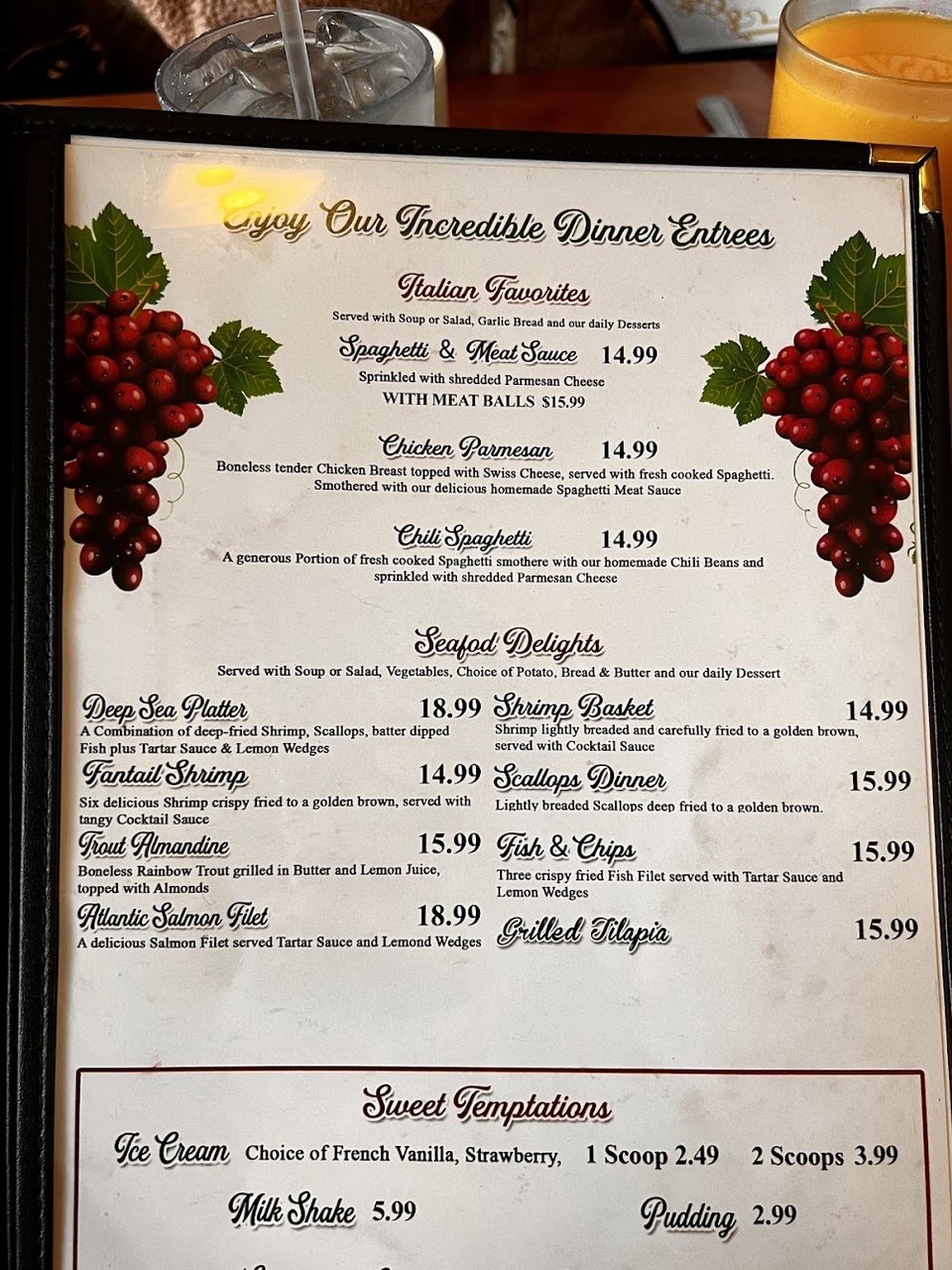 Breakfast menu page with pancakes, French toast, and eggs.